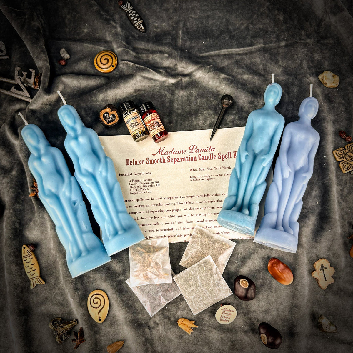 Deluxe Smooth Separation Candle Spell Kit components: four beeswax figure candles, forged nail, herbs and two spiritual oils