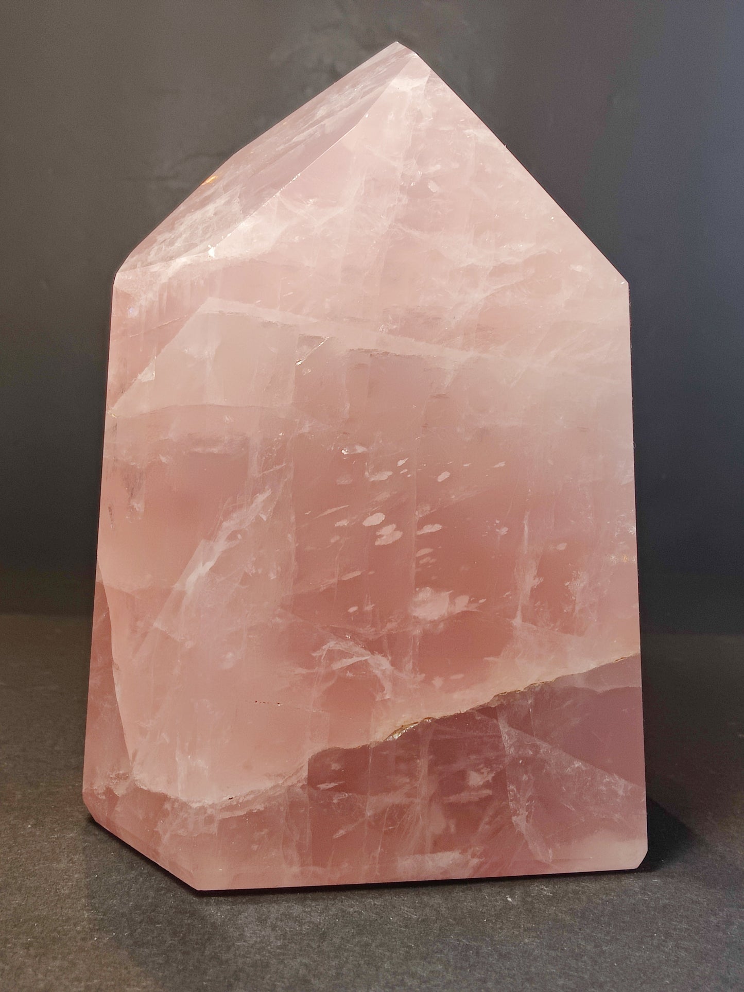 Polished rose quartz obelisk tower in soft translucent pink, standing upright — view 5