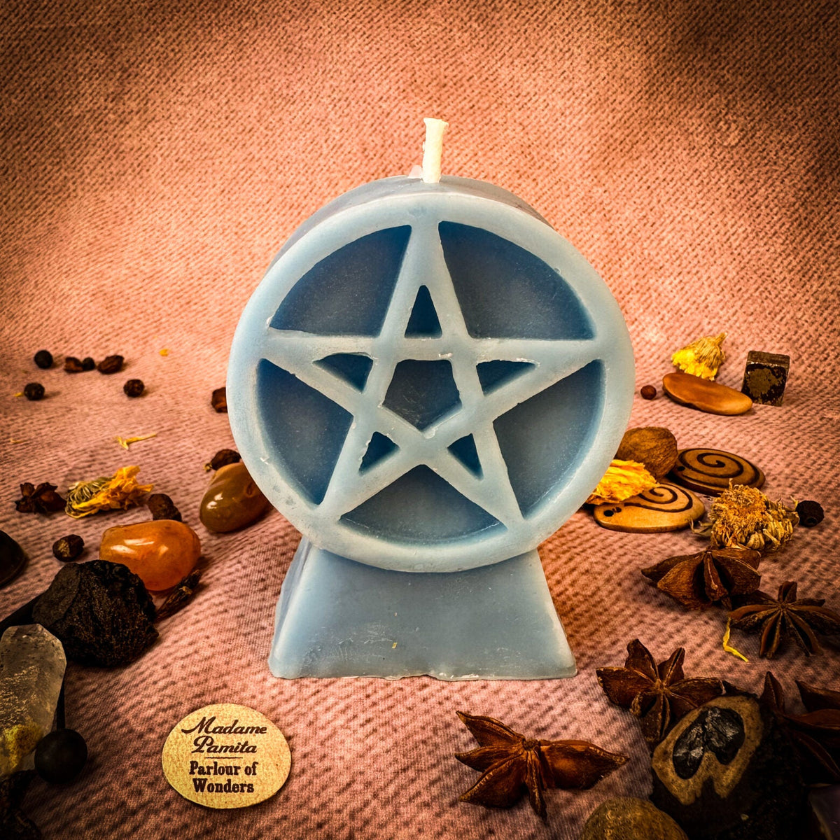 Pentacle of Protection beeswax candle in blue-gray with herbs and botanicals