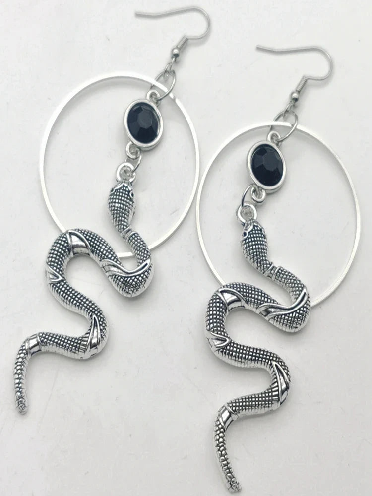 Stainless steel snake hoop earring with a black stone set in the serpent head — view 3 of 3
