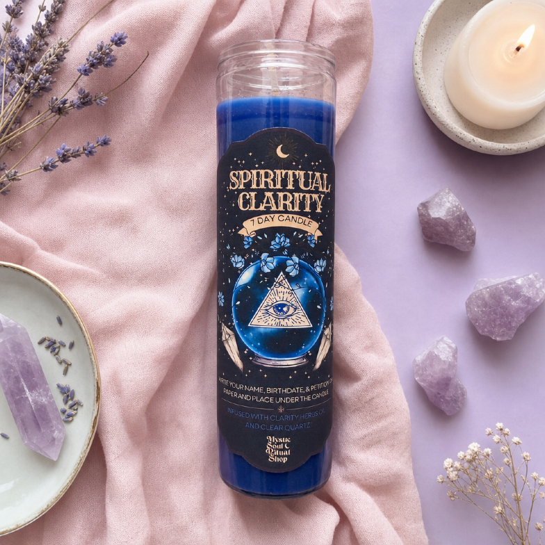 A tall blue seven-day glass jar candle with a Spiritual Clarity label.