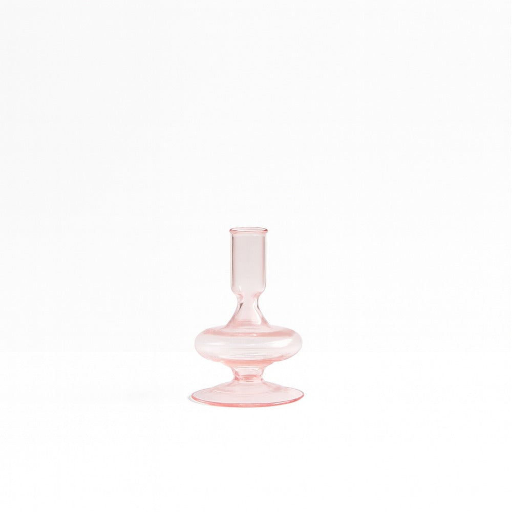 Pink Siri glass candle holder in the 5 inch size on white