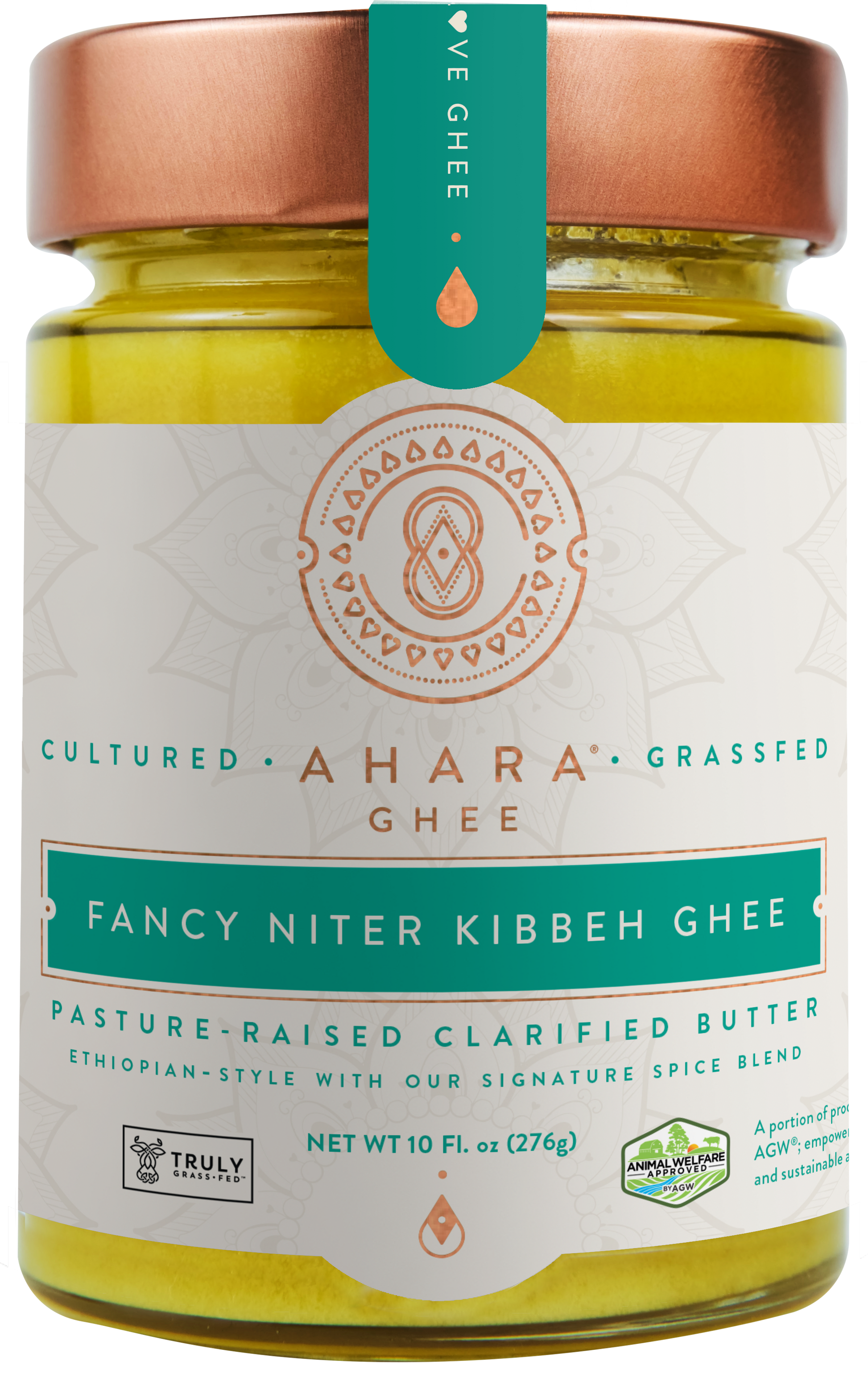 A glass jar of Ahara Rasa Fancy Niter Kibbeh spiced grass-fed ghee with a copper lid and teal label band.