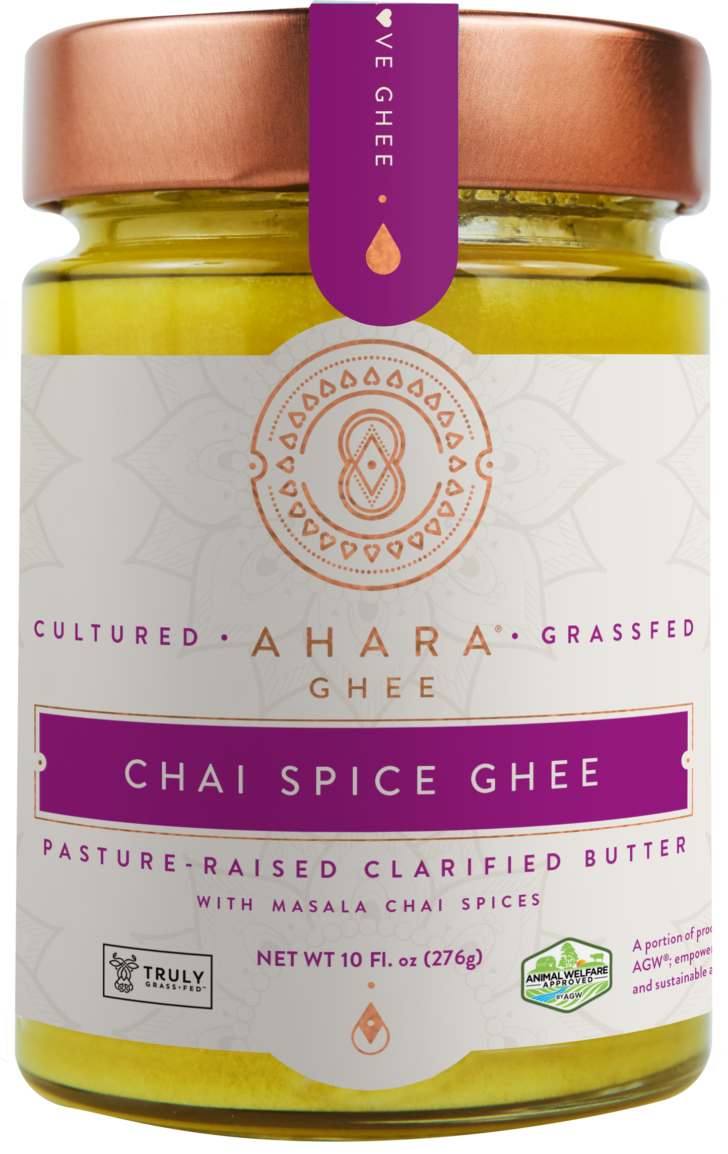 A glass jar of Ahara Rasa Chai Spice grass-fed ghee with a copper lid and purple label band.