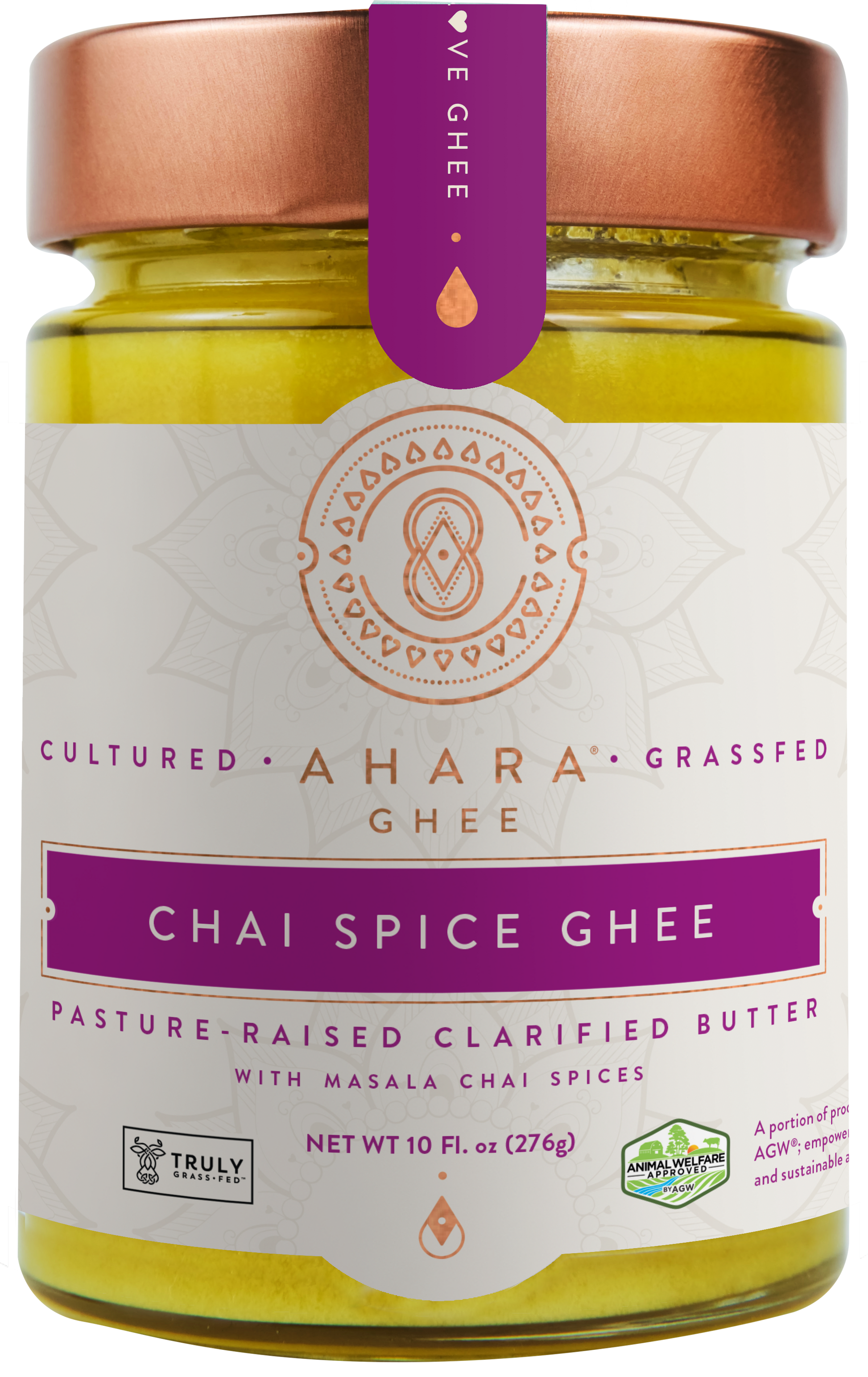 A glass jar of Ahara Rasa Chai Spice grass-fed ghee with a copper lid and purple label band.