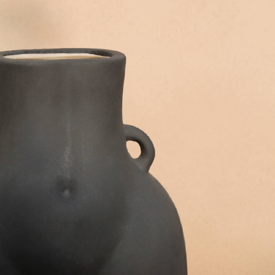 Off-black Her Vase in matte charcoal, detail of the open neck and side handle