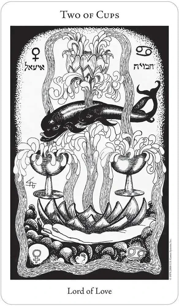 Two of Cups card, subtitled Lord of Love, with lotus and dolphin imagery