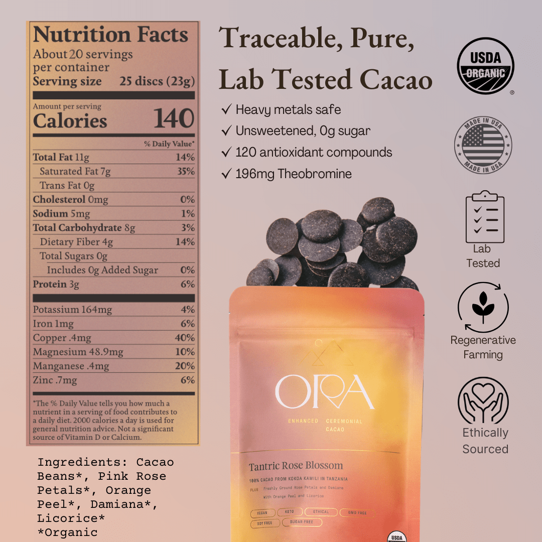 Ora Cacao Tantric Rose Blossom ceremonial cacao blend shown in a warm, softly lit styled scene.