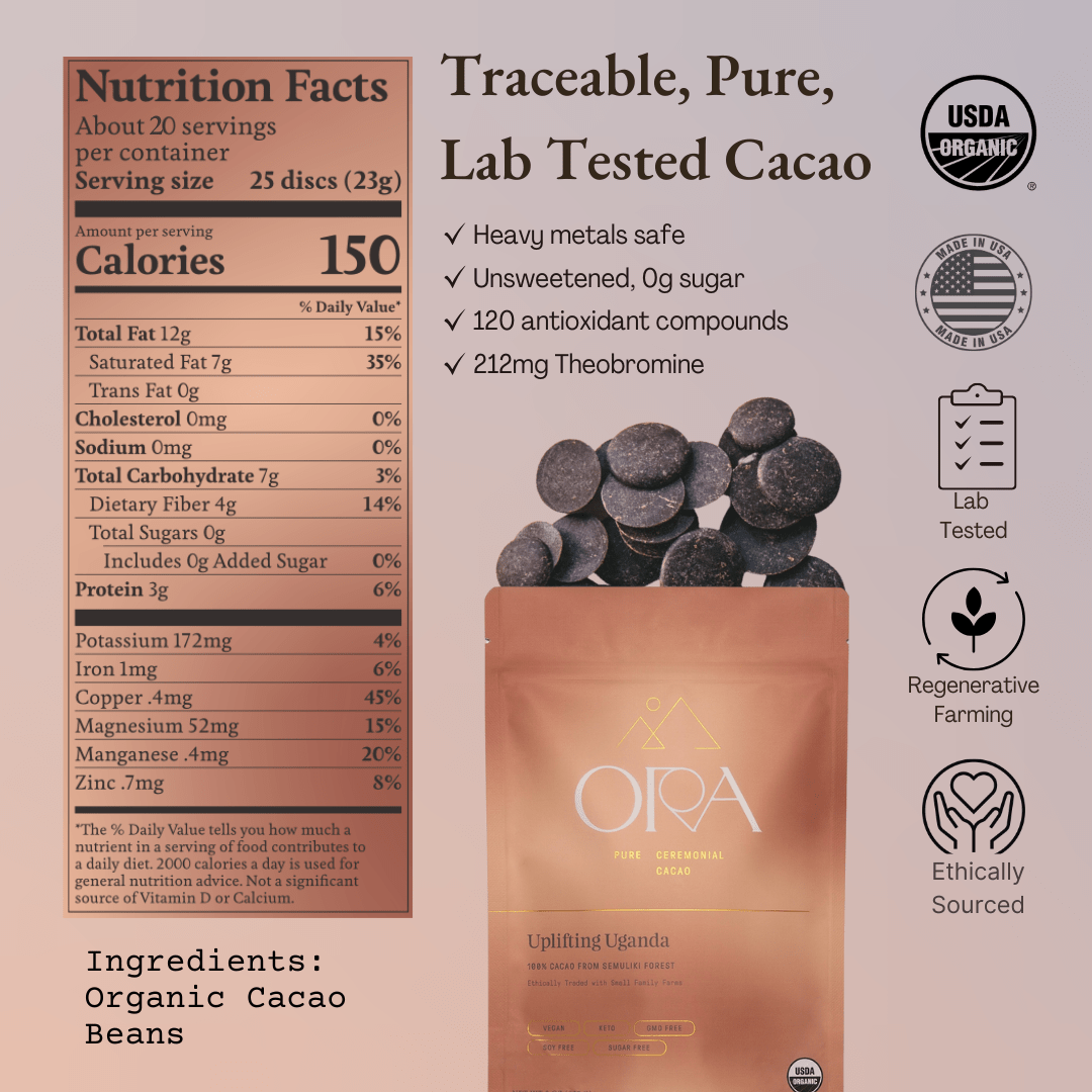 Ora Cacao Uplifting Uganda pure ceremonial cacao shown in a warm, softly lit styled scene.