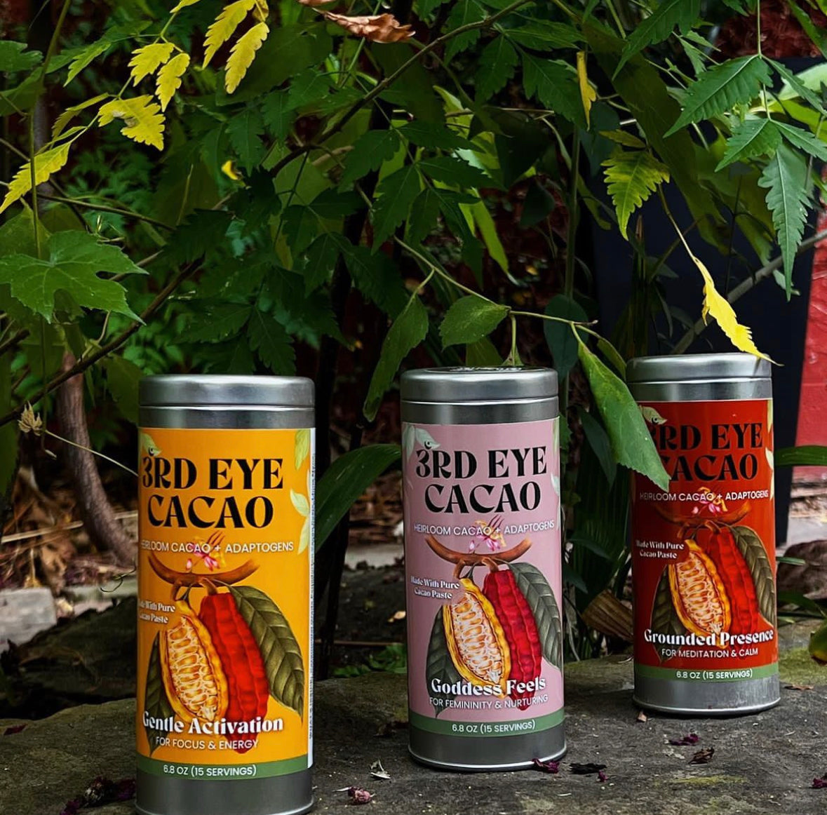 Prepared cup of ceremonial cacao elixir beside its canister.