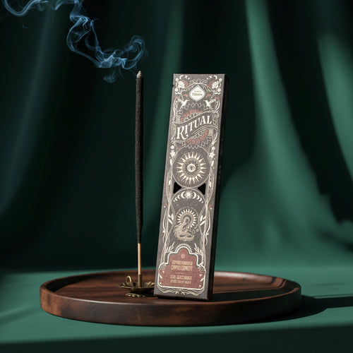 A box of Empowerment ritual incense sticks scented with coffee and sweet vanilla.