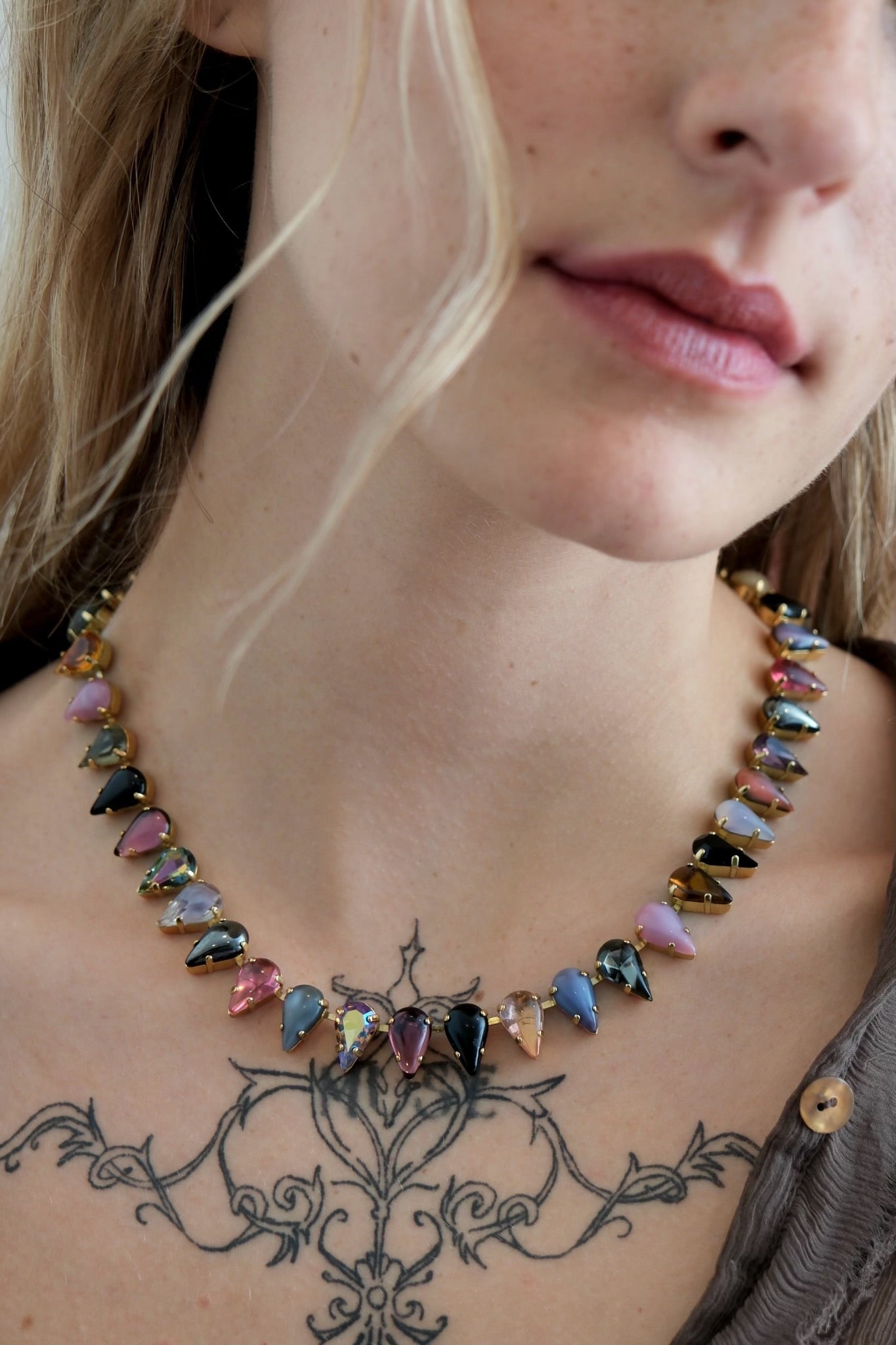 A gold-finish choker set with fang-shaped multicolored vintage glass stones — additional product view 3.