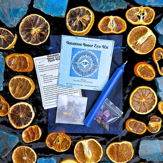 The Inner Eye Intuition Spell Kit with a blue chime candle, charoite crystals and blue lotus.