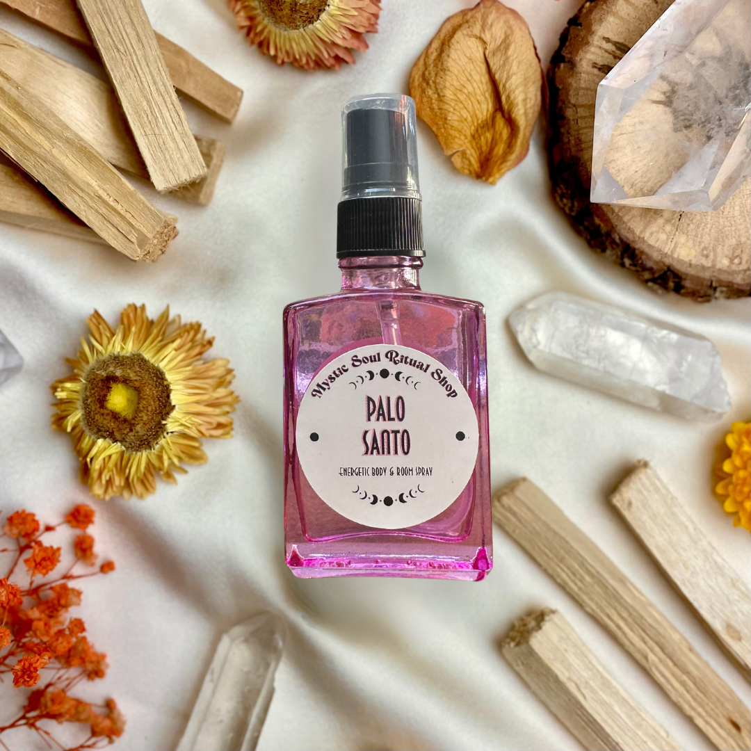 A spray bottle of Palo Santo Smudge Spray, a smoke-free cleansing mist.