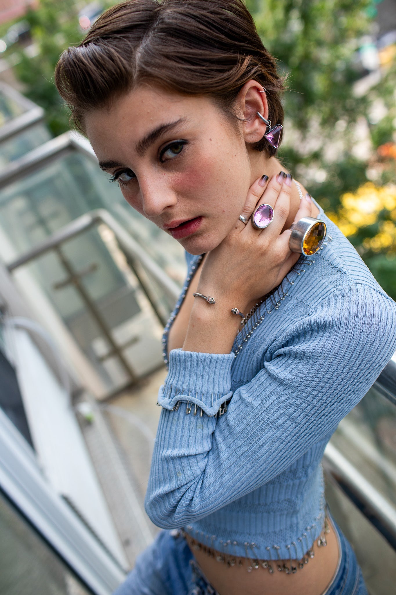 A statement ring with a carved azalea pink glass stone in a tall oxidized silver setting — additional product view 5.