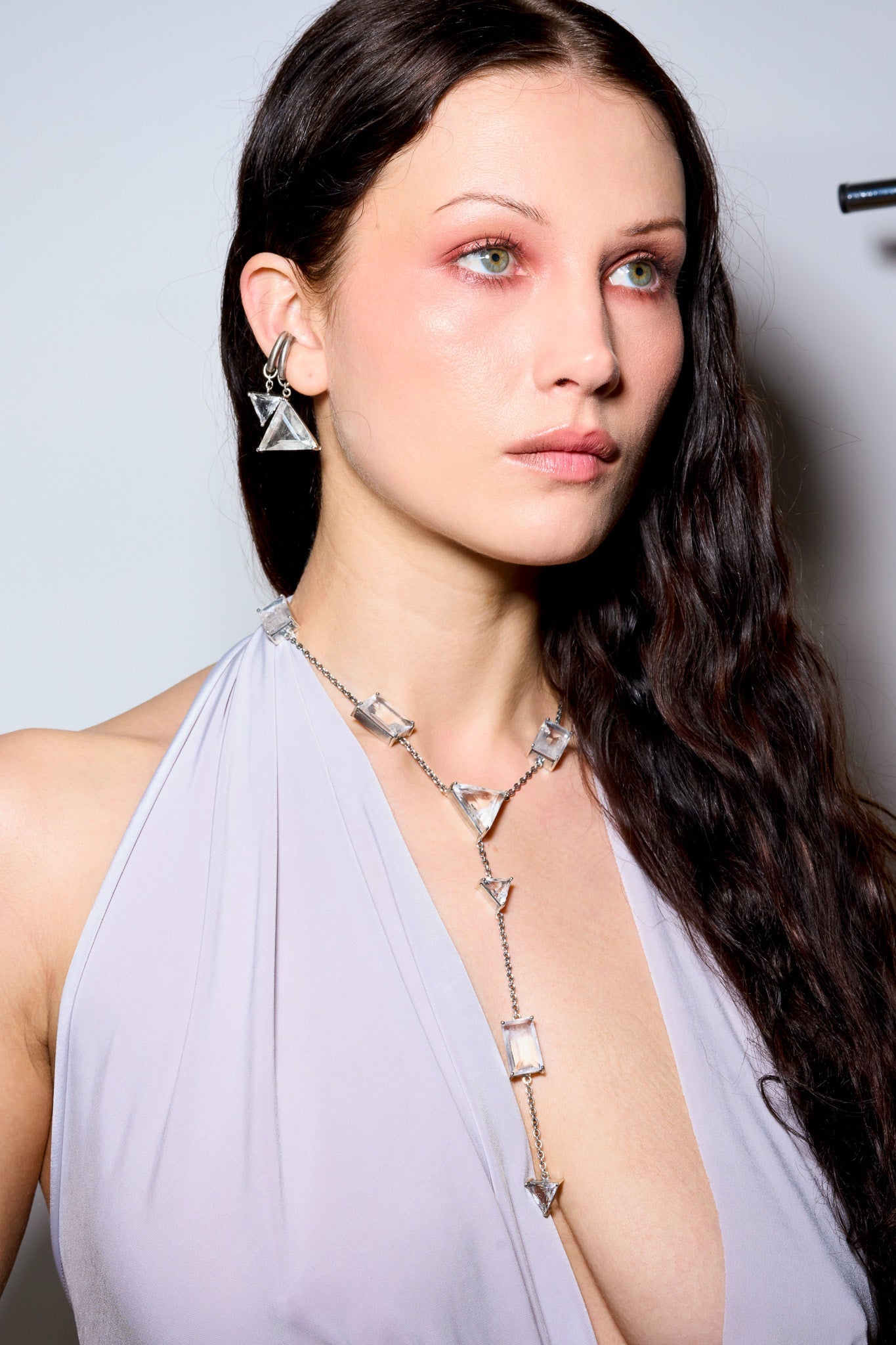 A silver Y-chain necklace with natural striated crystal quartz shards draped between cable chain — additional product view 4.
