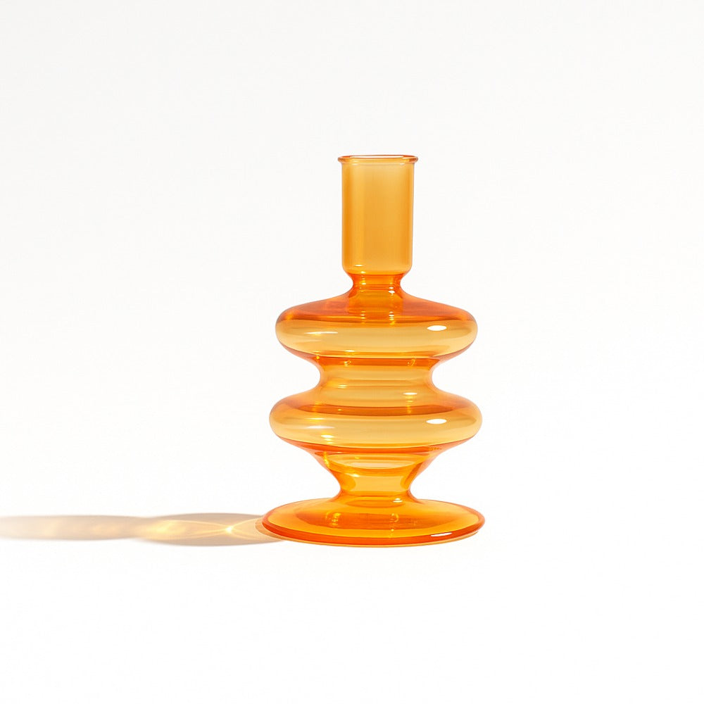 Amber Gigi glass candle holder in the 5 inch size on white