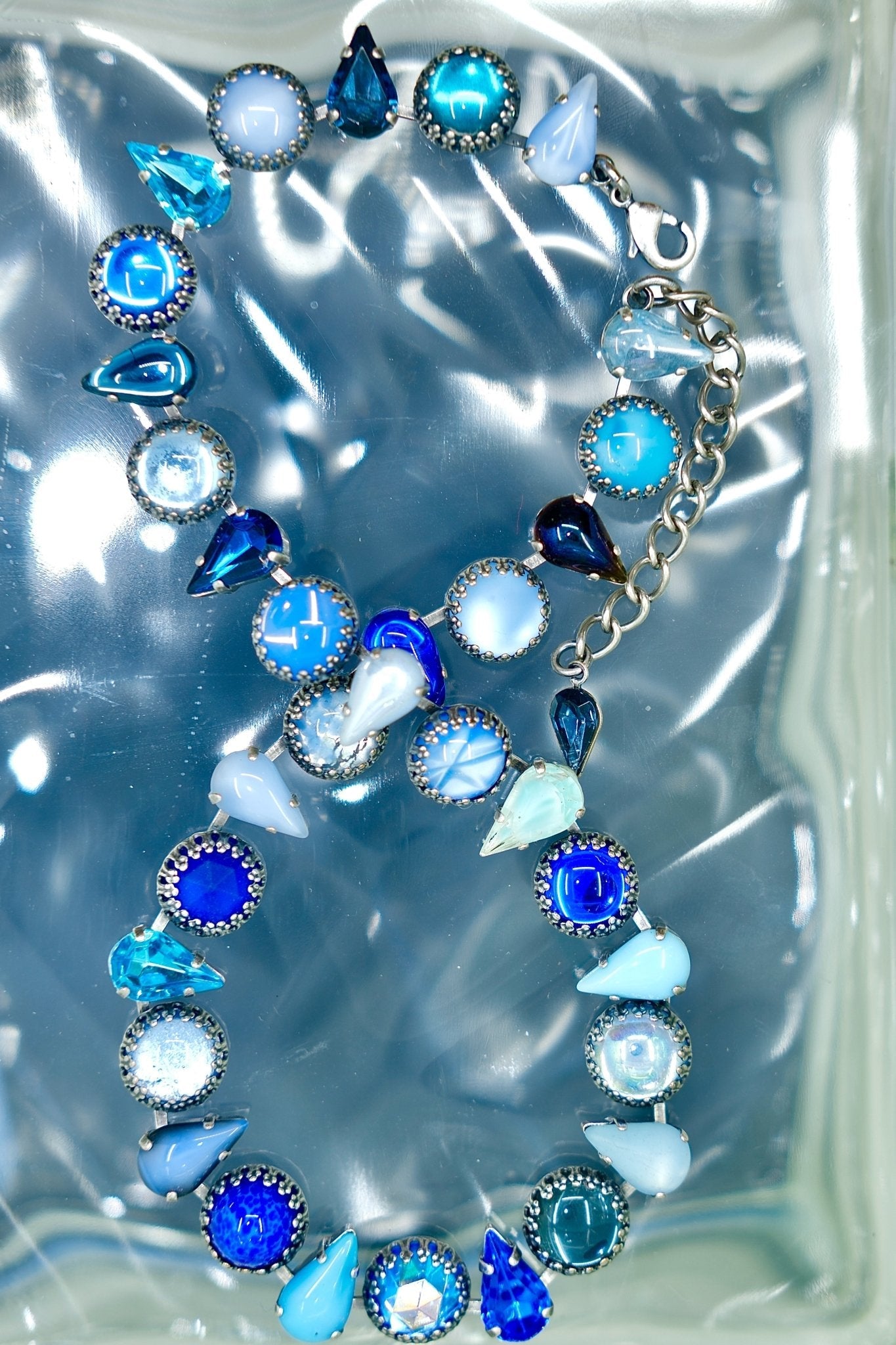 Detail of navy, cerulean and sea foam glass stones