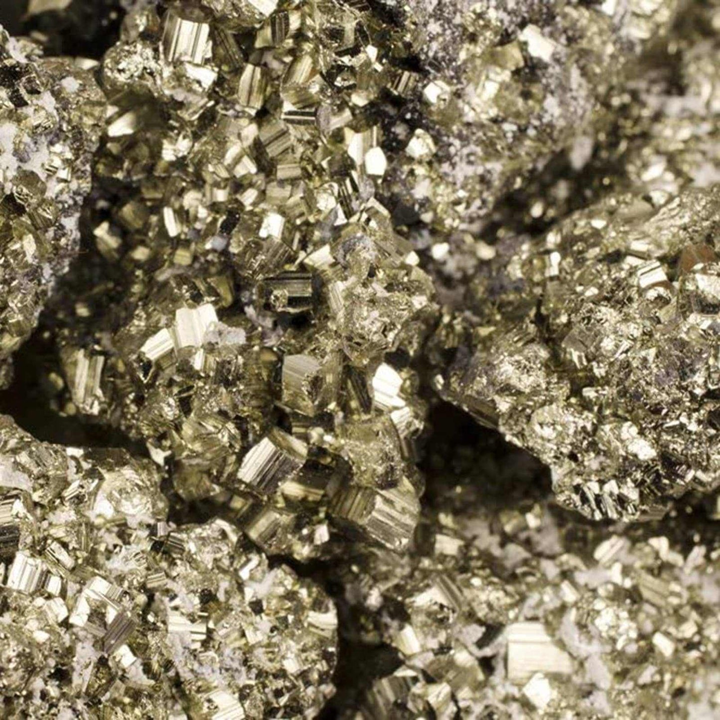 Rough Cocada Pyrite specimen from Peru with rounded golden botryoidal clusters, shown in a styled setting