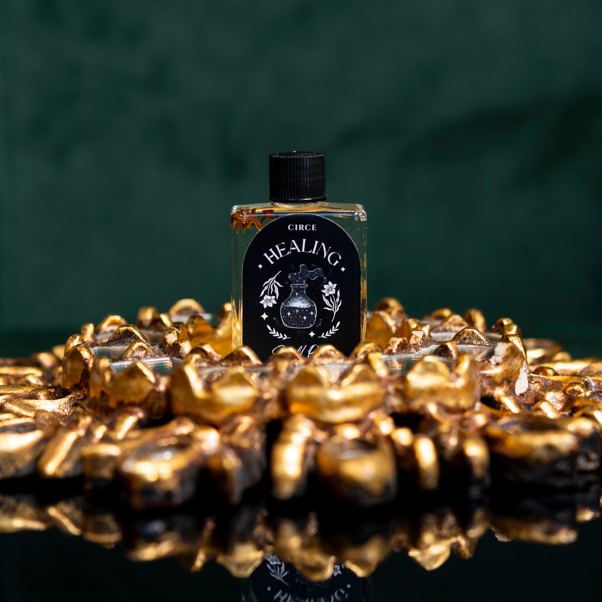 Healing ritual oil in a half ounce twist-top glass bottle with calendula (view 2)