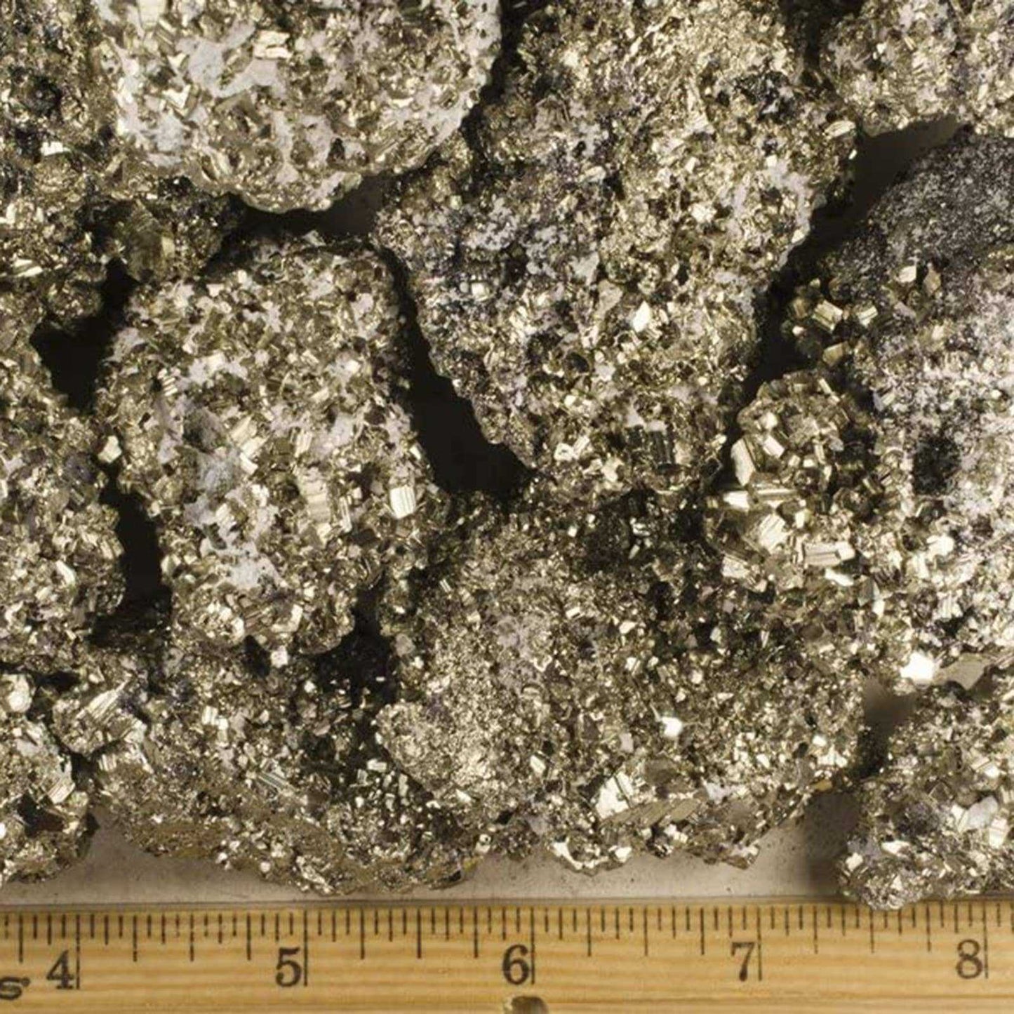 Rough Cocada Pyrite specimen from Peru with rounded golden botryoidal clusters, close-up detail