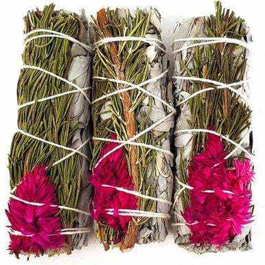 Four-inch smudge stick of white sage bound with rosemary sprigs and a soft pampas plume