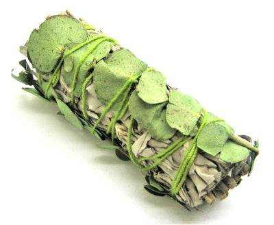 Four-inch white sage smudge stick bound with silvery green eucalyptus leaves