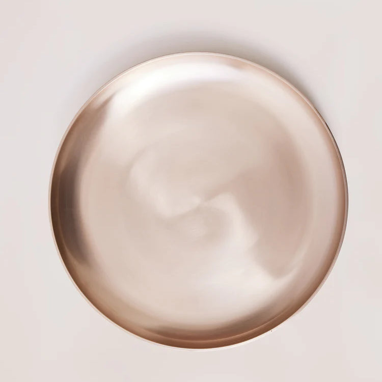 Kansa bronze platter from above, showing the hand-finished sheen
