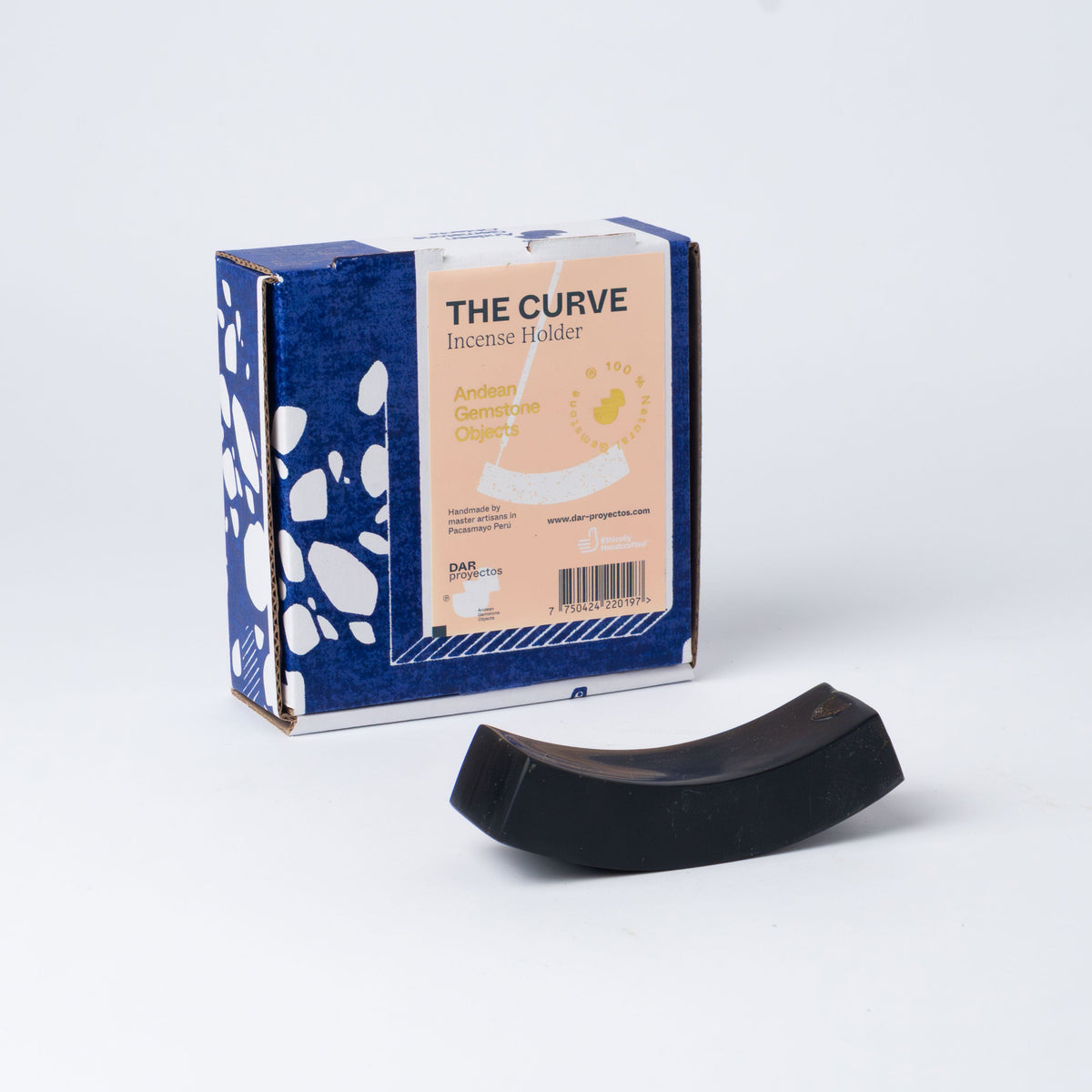 Black onyx Curve incense holder lying beside its printed retail box