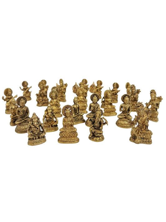 Small brass statue figurine sized to fit in the palm of a hand, front view