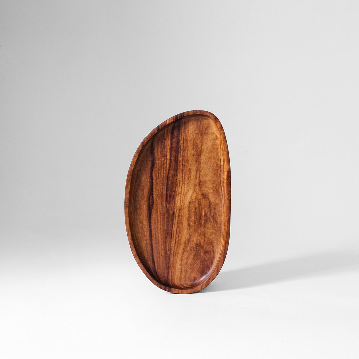 Narrow leaf tray stood on edge, showing the slim silhouette and grain direction