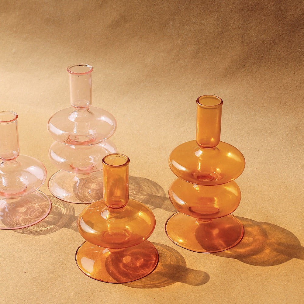 Gigi and Siri glass holders grouped in amber and pink across both sizes