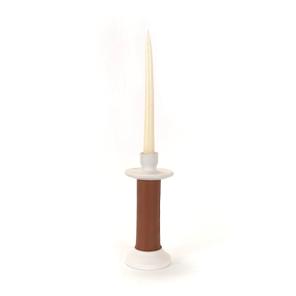 Medium brown leather-wrapped candle holder seen from the front