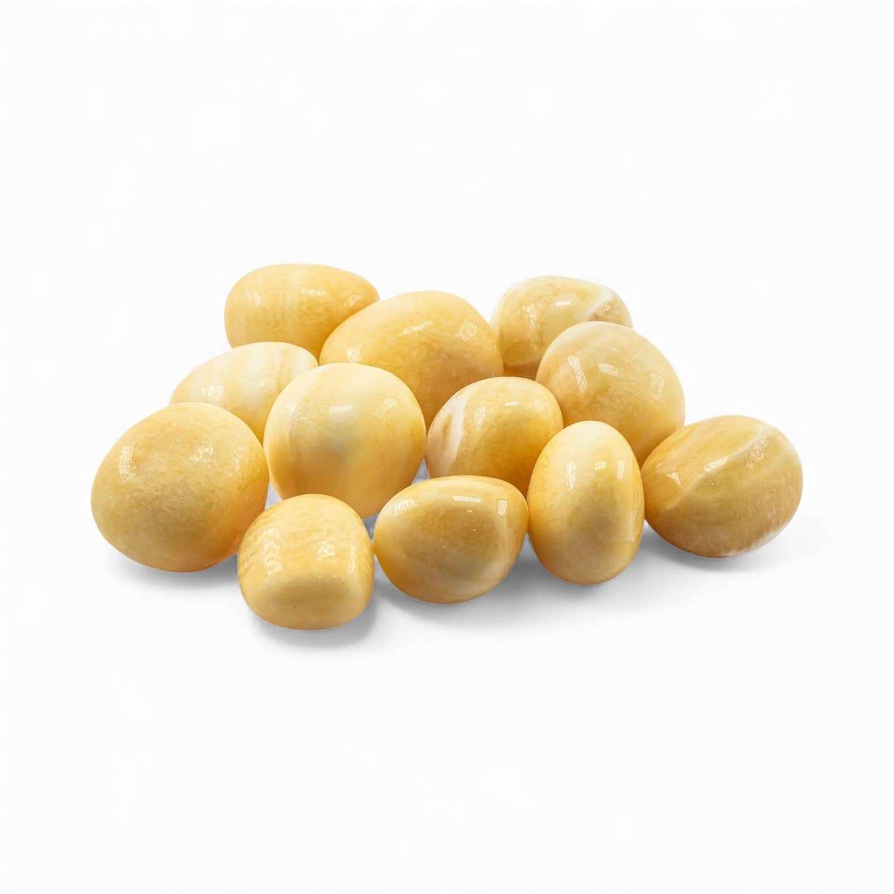 A yellow aragonite pocket stone shown from another angle, polished smooth.