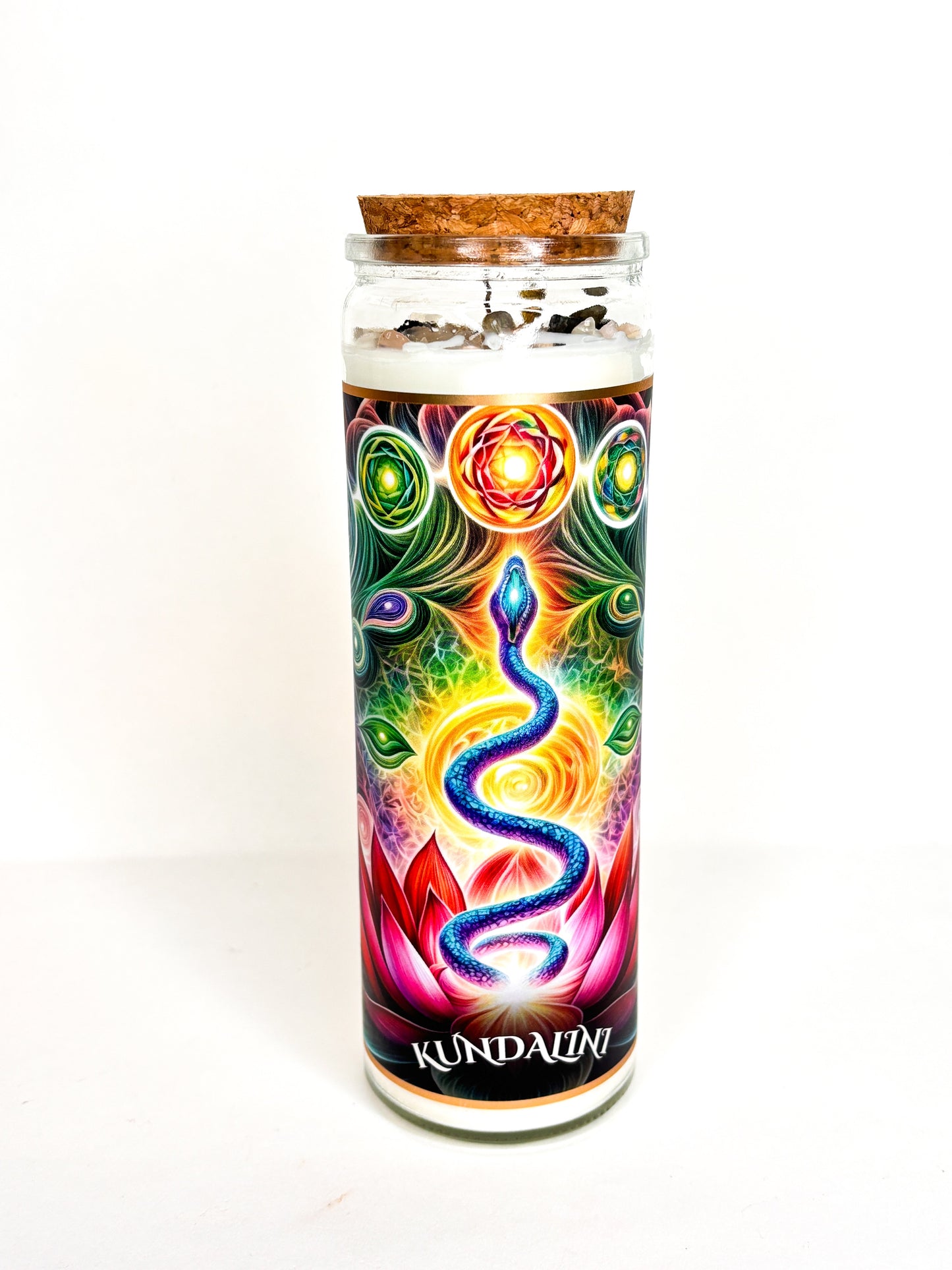Kundalini Shakti crystal altar candle in a clear glass vessel, topped with crystals