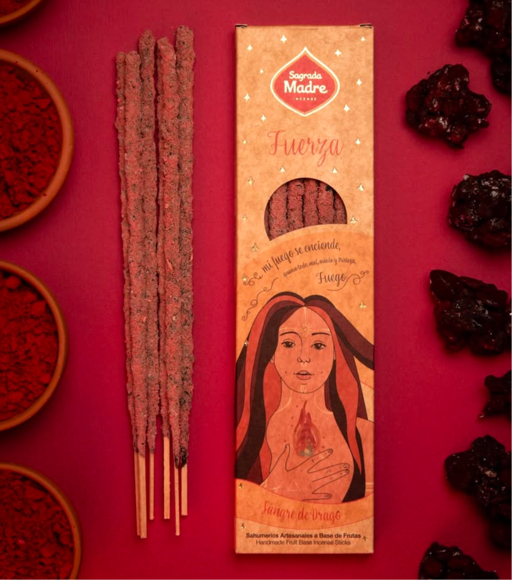 Fuerza Force incense pack with sticks laid on a deep red background
