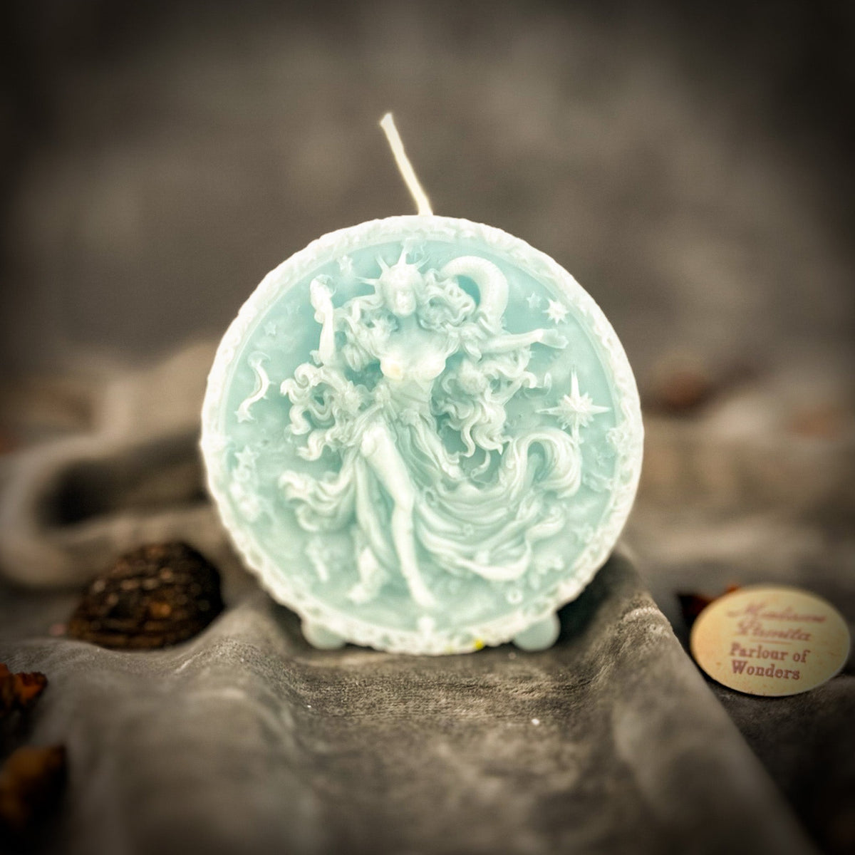 Blue beeswax Aquarius Water Bearer zodiac spell candle for innovation and independence
