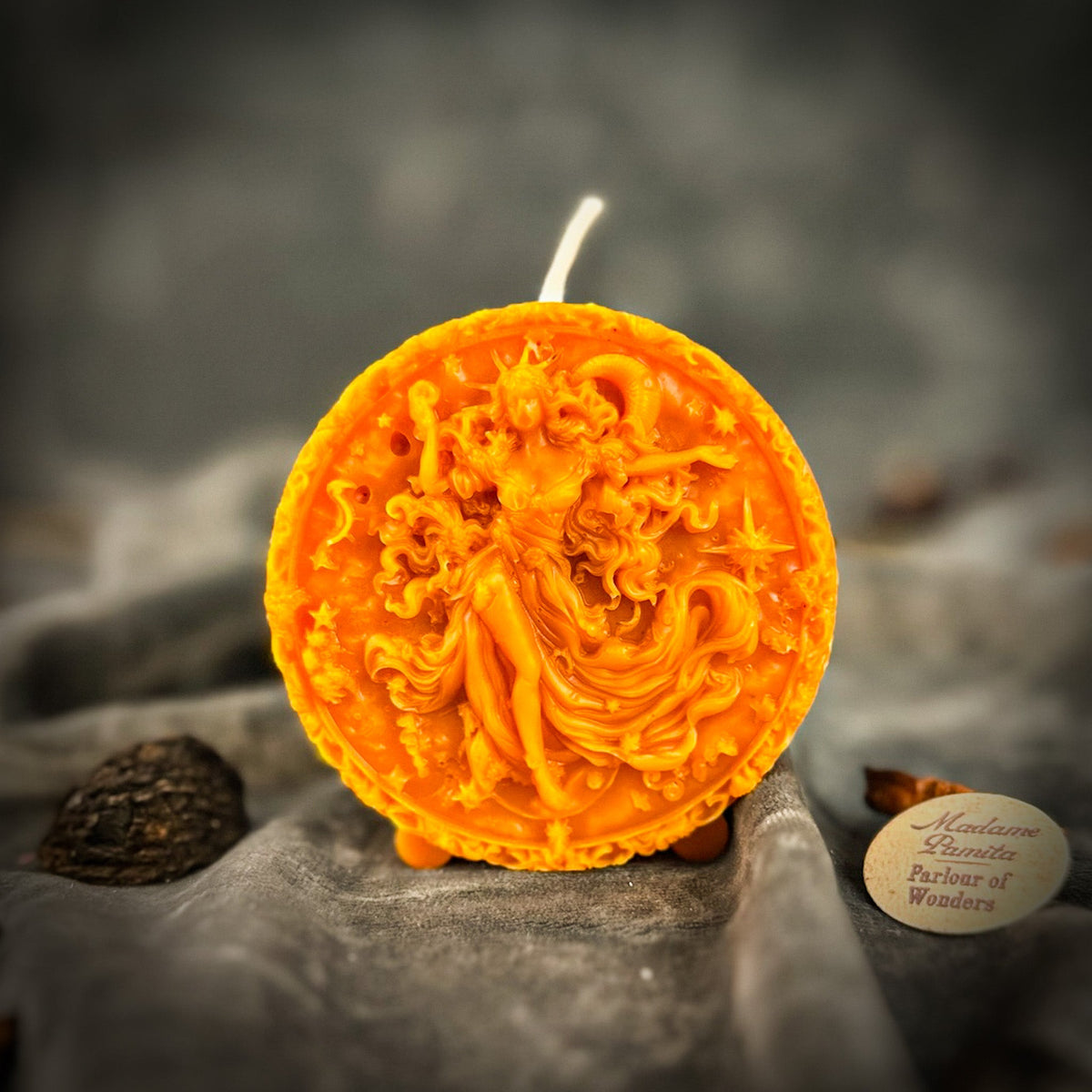 Orange beeswax Aquarius Water Bearer zodiac spell candle for innovation and independence