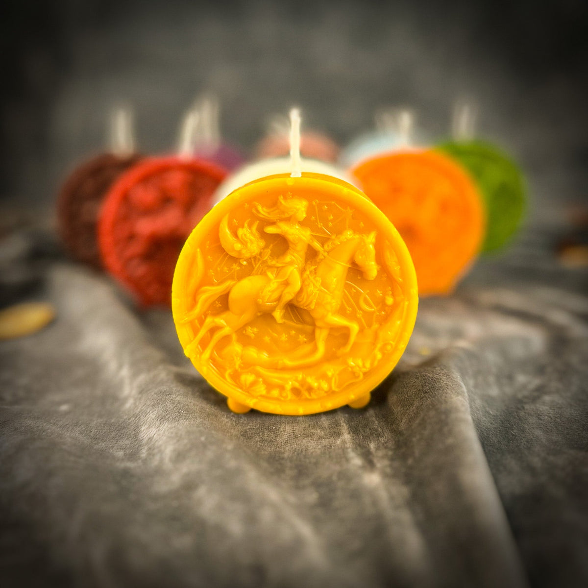Sagittarius Archer zodiac spell candles grouped together in several colors