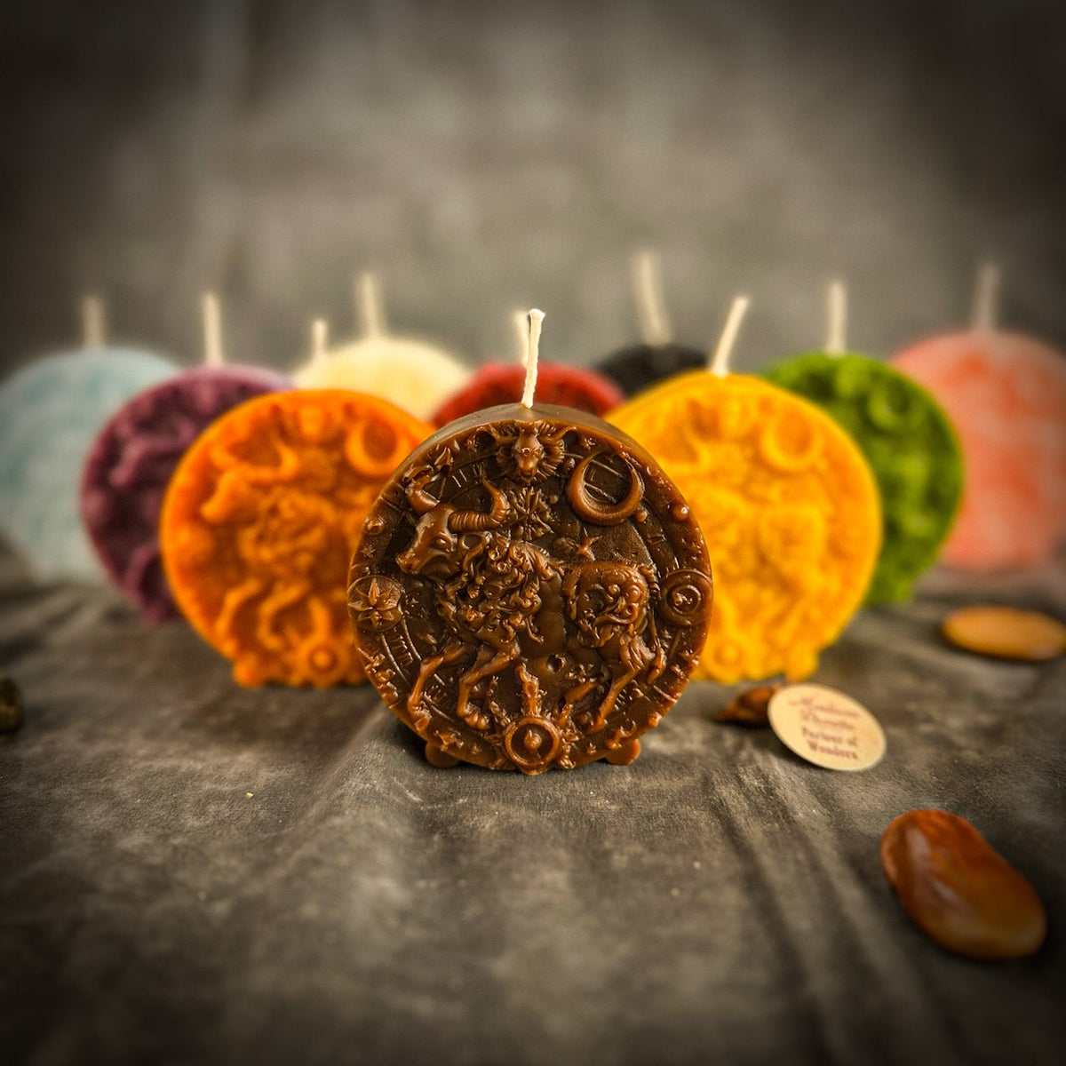 Taurus Bull zodiac spell candles grouped together in several colors
