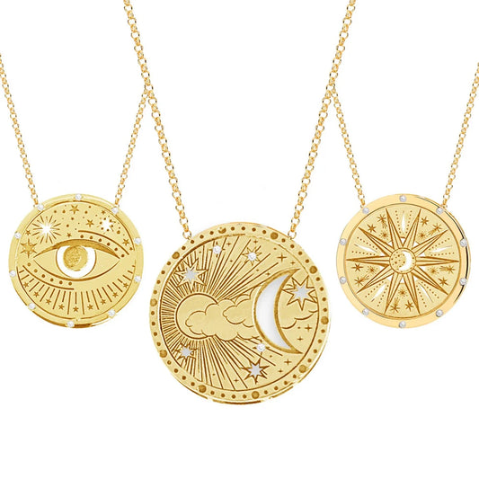 Gold-tone boho pendant necklace with celestial charm on a fine chain — view 1 of 6