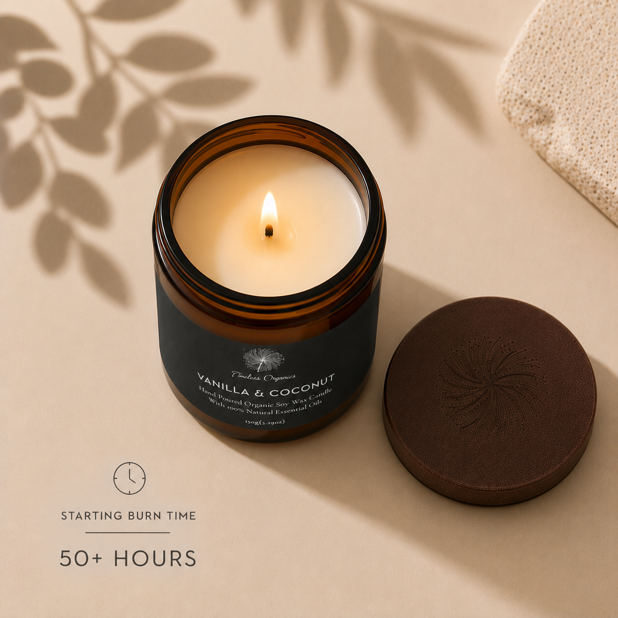 Vanilla and Coconut candle with the lid set beside the jar