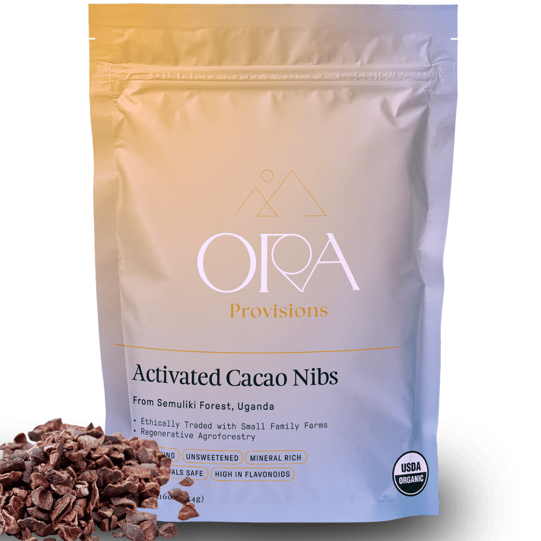 Ora Cacao organic cacao nibs shown on a plain neutral background.