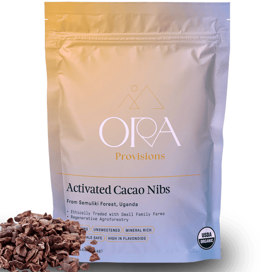 Ora Cacao organic cacao nibs shown on a plain neutral background.