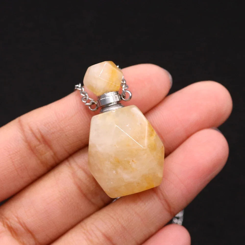 Small glass potion bottle pendant filled with crystals on a stainless steel chain — view 11 of 12