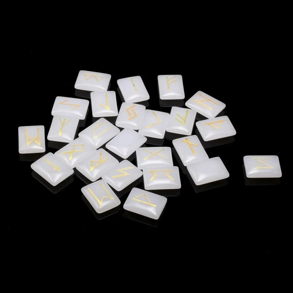 Set of rectangular crystal rune tiles engraved with runic symbols on a dark surface — view 9 of 12