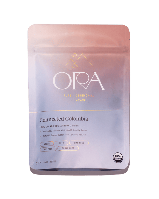 Front of the Ora Connected Colombia ceremonial cacao pouch with cacao discs