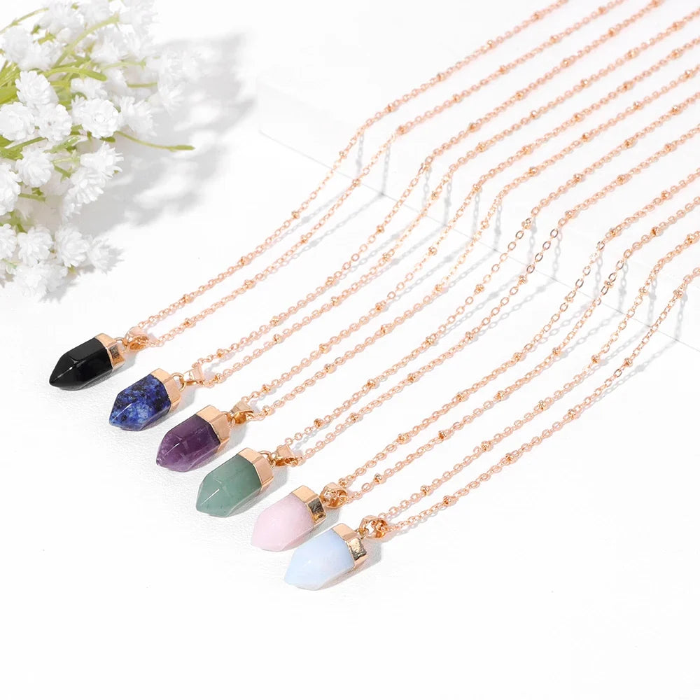 Crystal point pendant necklace with a hexagon gemstone column on a gold-tone link chain — view 18 of 20