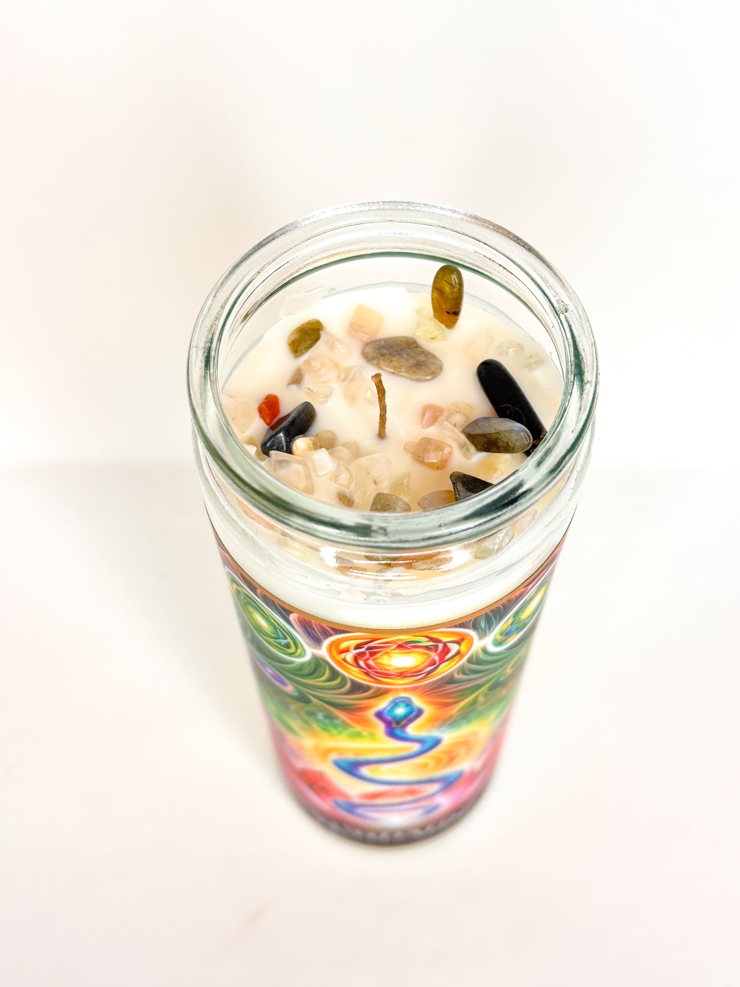 The Kundalini Shakti altar candle lit, showing the flame and melt pool