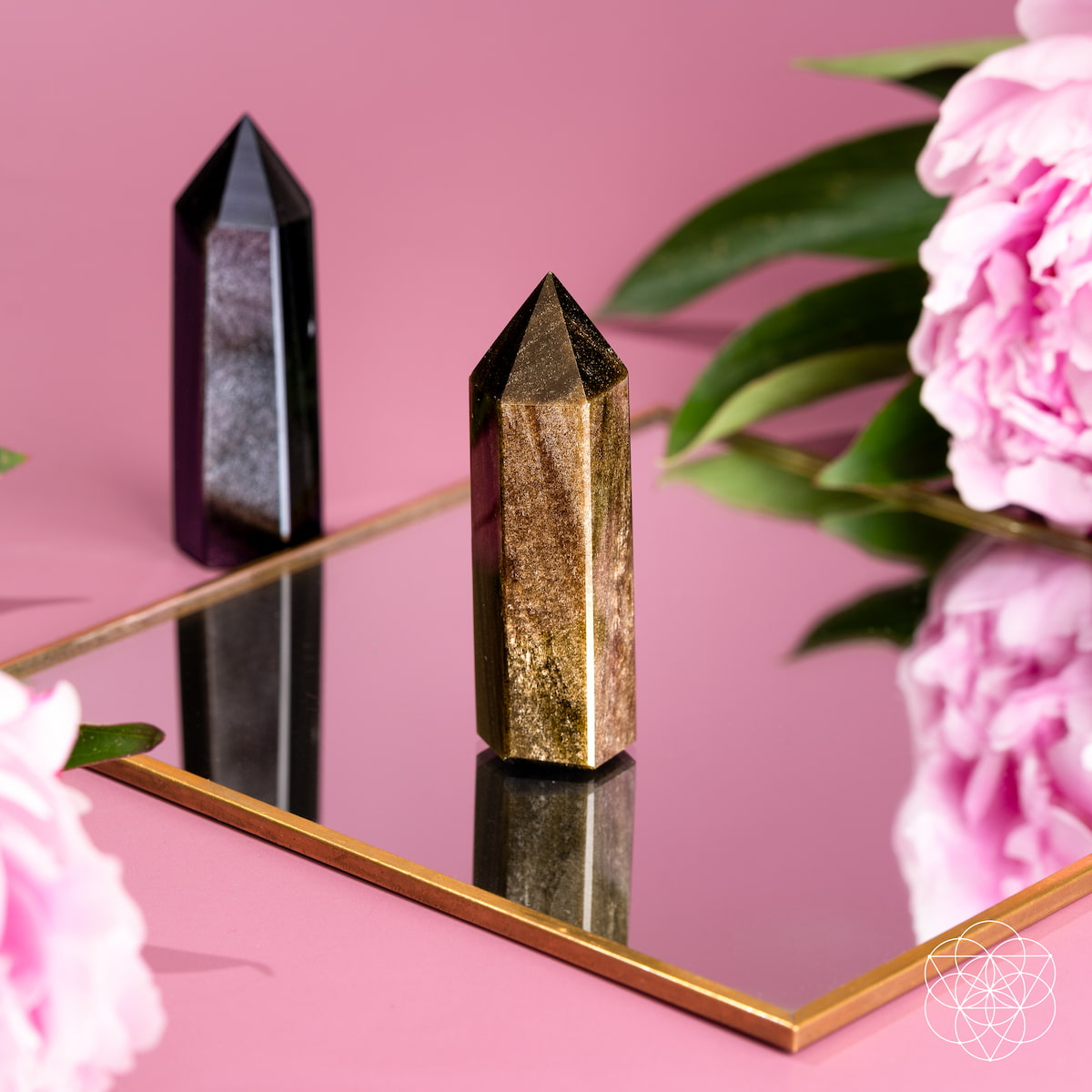 Gold Sheen and Silver Sheen Obsidian crystal points catching the light — view 6